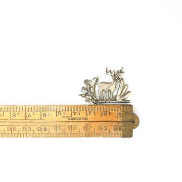 Reindeer brooch white metal with red rhinestones