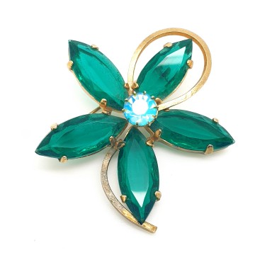 Goldtone flower brooch with unfoiled emerald green navette shaped glass stones and ab rhinestone 40s - Bliinkt