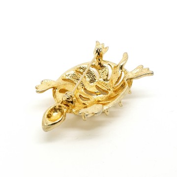 'Art' goudkleurige schildpadbroche