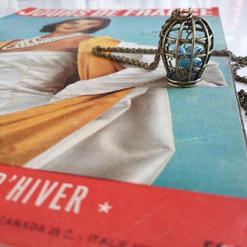 Avon bird cage necklace