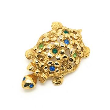 Avon - goldtone turtle brooch with flowered back and multicoloured rhinestones - Bliinkt