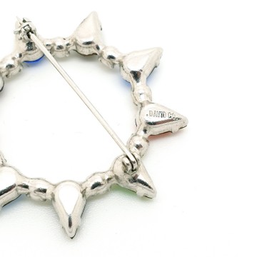 B. David round silvertone multicoloured brooch