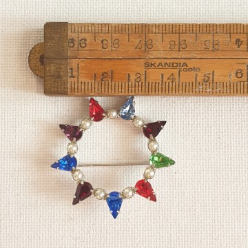 B. David round silvertone multicoloured brooch