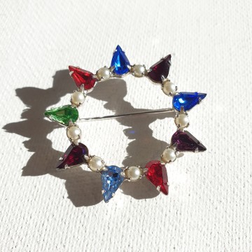 B. David round silvertone multicoloured brooch