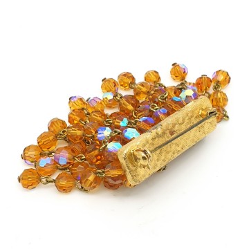 Amber coloured ab glass stone dangle brooch  - Bliinkt