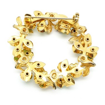 Beaujewels set goldtone leaves with blue and green rhinstones wreath back