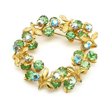 Beaujewels set goldtone leaves with blue and green rhinstones wreath