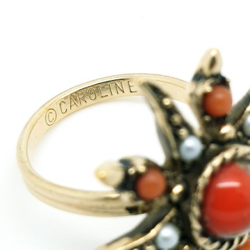 Ring 'Antique Star' by Caroline Emmons with coral red beads red marbled centre stone and faux seed pearls Signature
