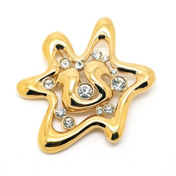 Big shiny goldtone star shaped brooch with clear rhinestones 80s - Bliinkt