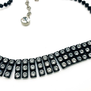Black short plastic necklace with clear rhinestones