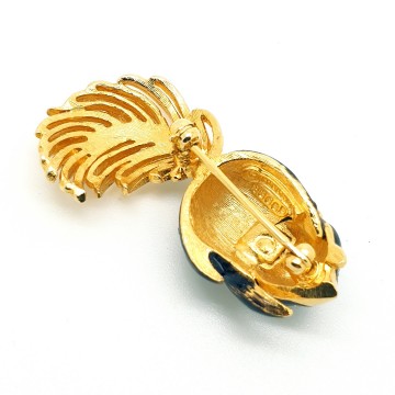 Marcel Boucher - goldtone black enamelled skunk brooch - Bliinkt