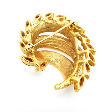 BSK goldtone brooch with facetted clear navette rhinestones