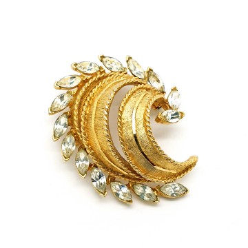 BSK goldtone brooch with facetted clear navette rhinestones