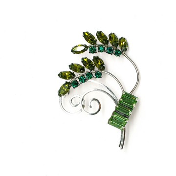 CC sterling brooch with green rhinestones