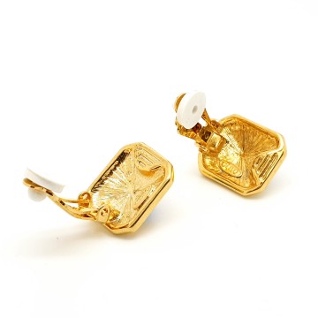 Ciro goudkleurige clips met helderblauwe cabochon