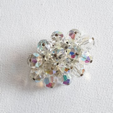 Heldere glaskralenbroche met aurora borealisgloed - Bliinkt