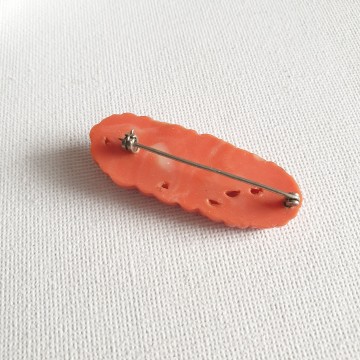 Coral red lucite flower brooch mid century