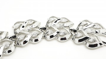 Coro zilverkleurige brede armband met hartvormige schakels