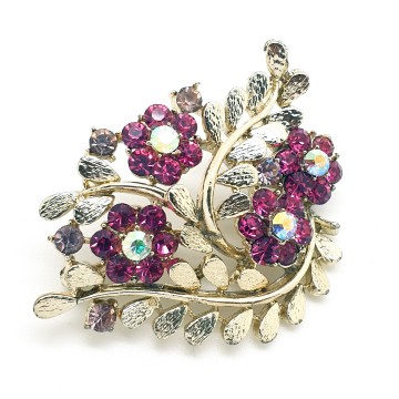 Coro - brooch with 'Schiaparelli pink' flowers - Bliinkt