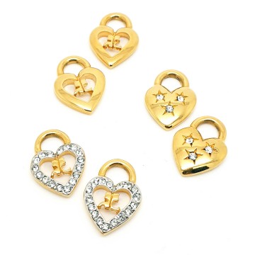 Courrèges Paris - goldtone hoop earrings with interchangeable hearts with logo - Bliinkt