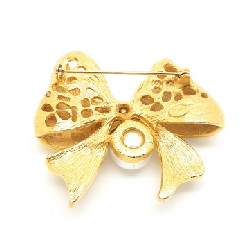 Craft - goldtone bow brooch with faux pearl and clear rhinestones - Bliinkt
