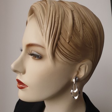 Crown Trifari silvertone open work dangle earrings