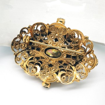 Czech layered goldtone brooch with leaves and brown faceted glass stone - Bliinkt