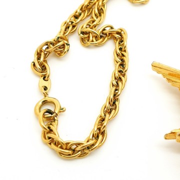 Florenza - goldtone sunburst pendant with brown cabochon and orange seed beads - Bliinkt