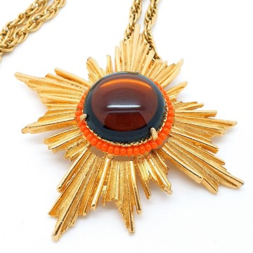 Florenza - goldtone sunburst pendant with brown cabochon and orange seed beads - Bliinkt