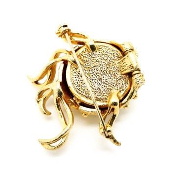 Goudkleurige kogelvisbroche van Fuller Brush Co.