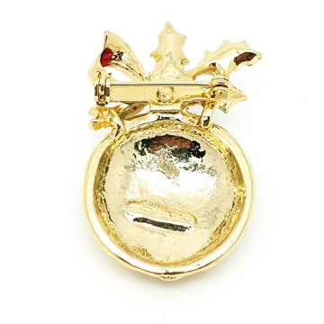 Goldtone bauble with mistletoe and red bow by Gerry's