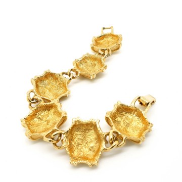 Goldtone bracelet with brushed links