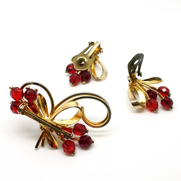 Goldtone brooch and earring set with red facetted beads