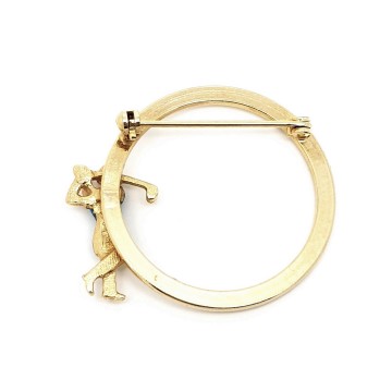Goldtone circle brooch with lady golfer in blue dress 2