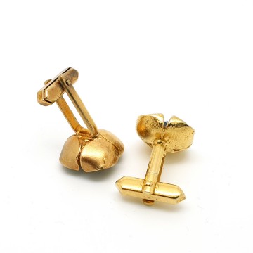 Goldtone cufflinks with facetted brown pyramid glass stone