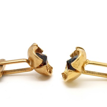 Goldtone cufflinks with facetted brown pyramid glass stone