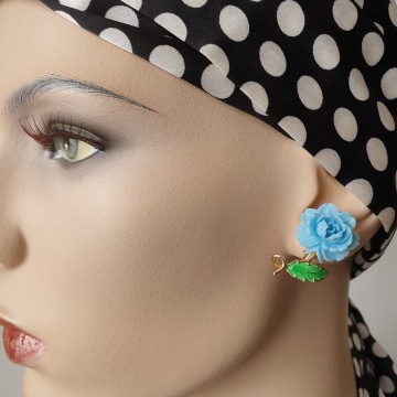 Goldtone earrings with babyblue plastic rose and green enamelled leaf