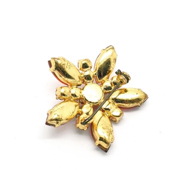 Flower shaped brooch with red navette and tiny clear rhinestones - Bliinkt