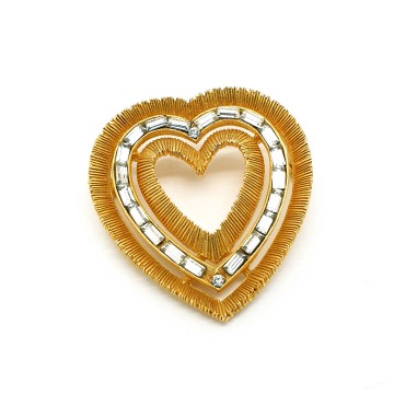 Goldtone heart brooch with baguette cut rhinestones