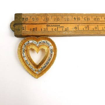 Goldtone heart brooch with baguette rhinestones