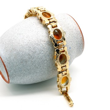 Goldtone link bracelet with clear and ocher faceted glass stones - Bliinkt