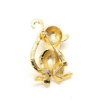 Goldtone monkey brooch with red glass eyes - Bliinkt