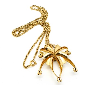 Goldtone necklace with spider pendant and amber rhinestones