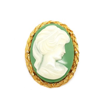 Goldtone oval brooch with green cameo