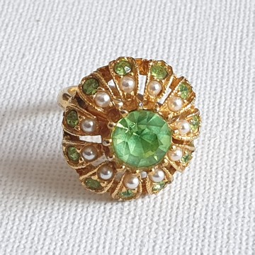 Goldtone ring with green rhinestones and faux seed pearls