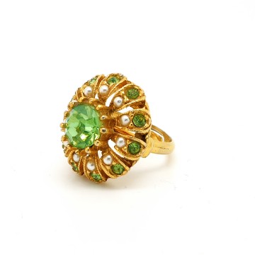 Goldtone ring with green rhinestones and faux seed pearls