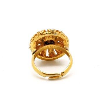 Goldtone ring with green rhinestones and faux seed pearls