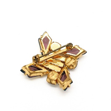 Bijzondere kleine goudkleurige broche met paarse strass - Bliinkt