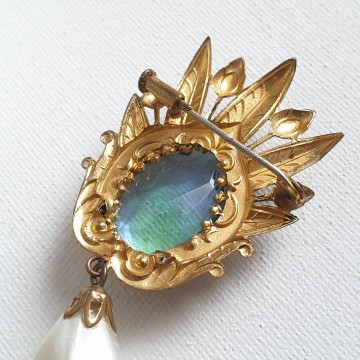 Goldtone brooch with blue stone and faux pearl