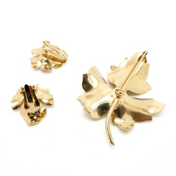 Goldtone leaf brooch and earring set